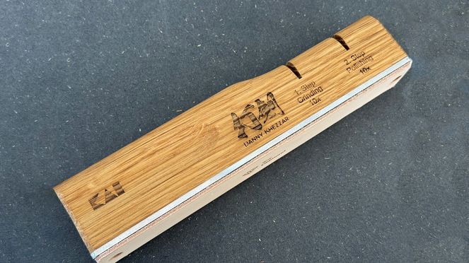 
                    Easy-to-use ‘all-in-one’ ‘New Edge knife sharpener by Danny Khezzar made especially for Kai from Swiss oak
